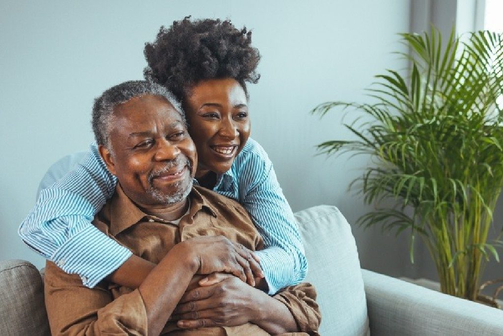 senior couple hugging, showing care and enjoy quality bonding time on home living